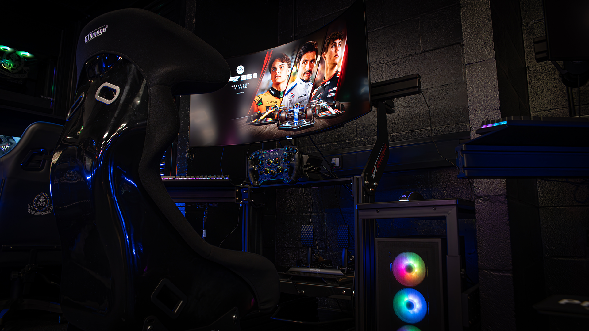High-performance racing simulator setup with curved monitors installed as part of a vocational esports arena facility.